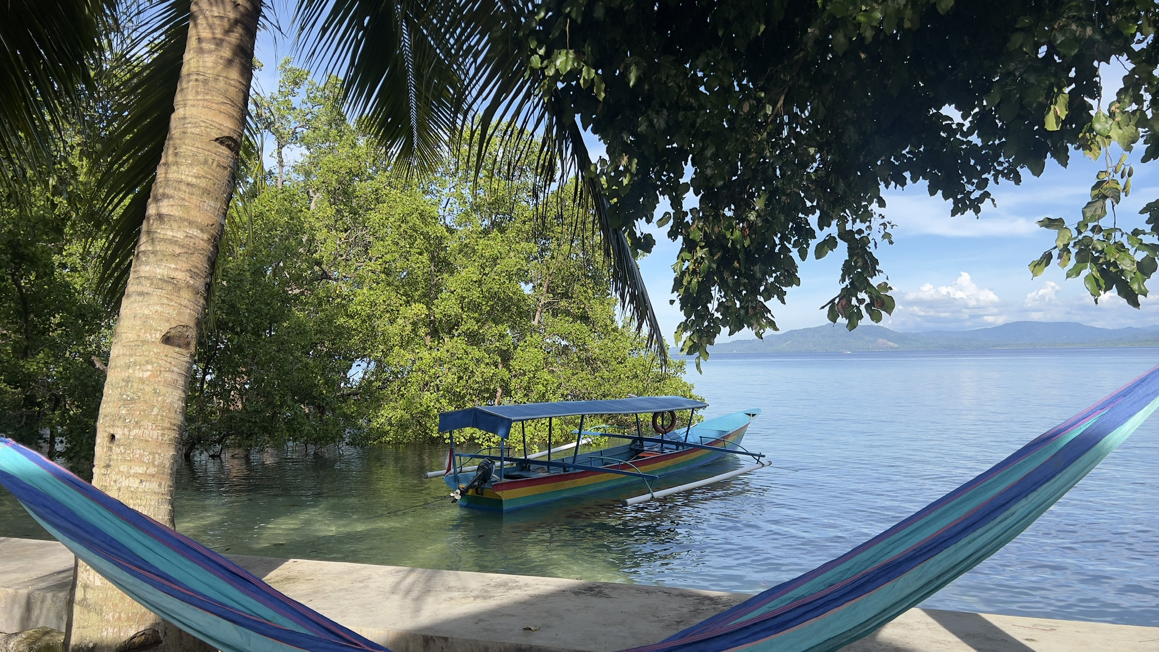 Ocean View Suite at Bunaken Sunrise Resort — Spacious villa with panoramic ocean views, private terrace, and direct beach access.
